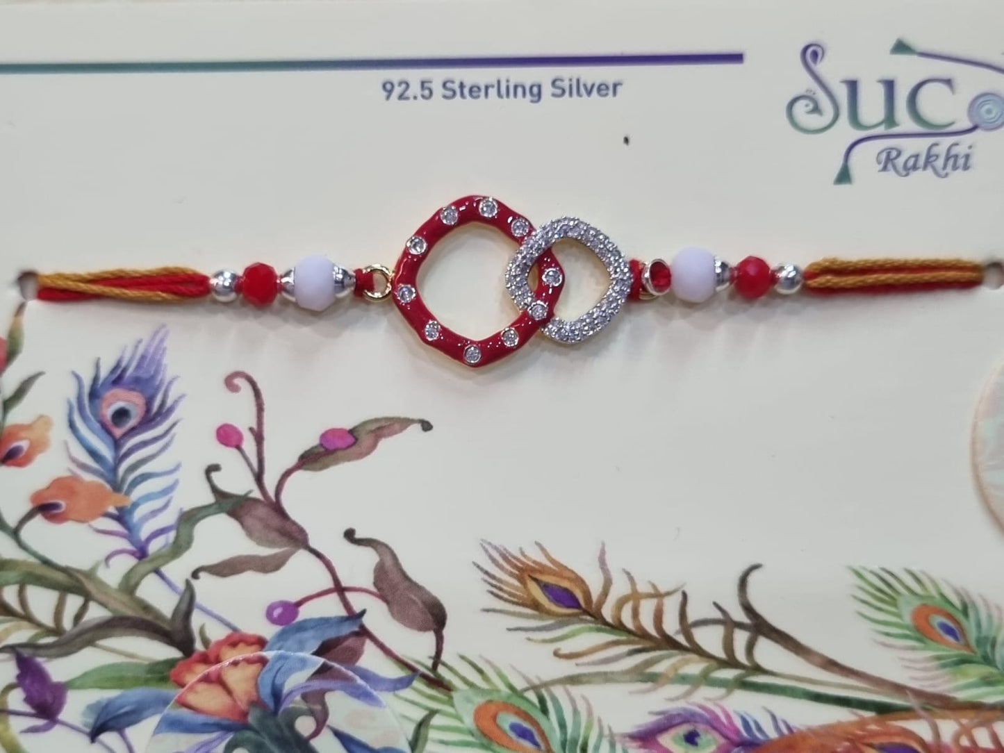 Sterling Silver Rakhi with Enamel and Zircons