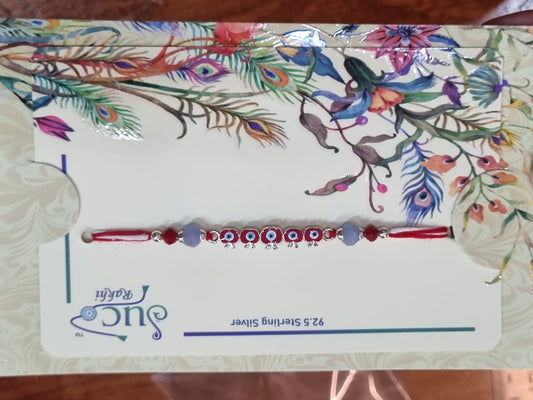 Sterling Silver Rakhi with Evil eye in apples Design